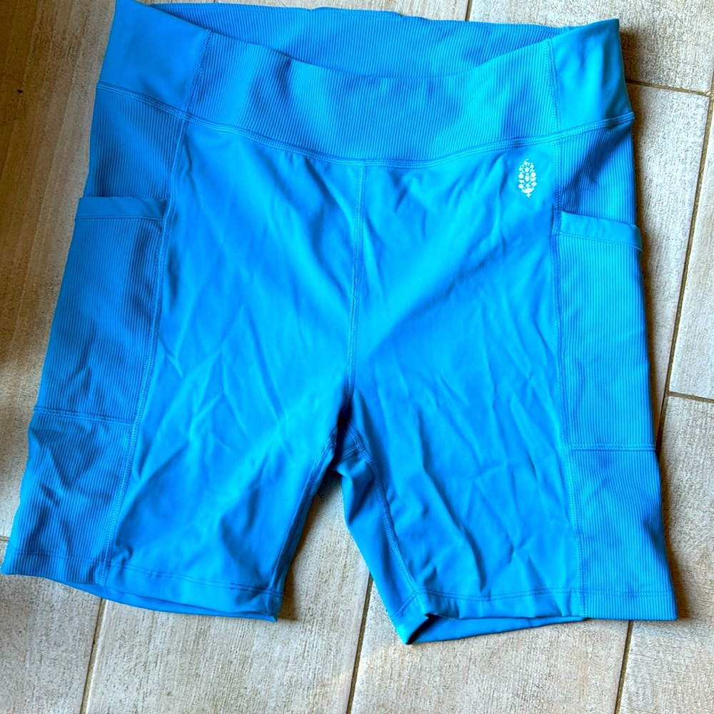 Varsity Blue Free People Movement running shorts. NWOT